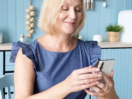 Client checking a smart water meter in their home