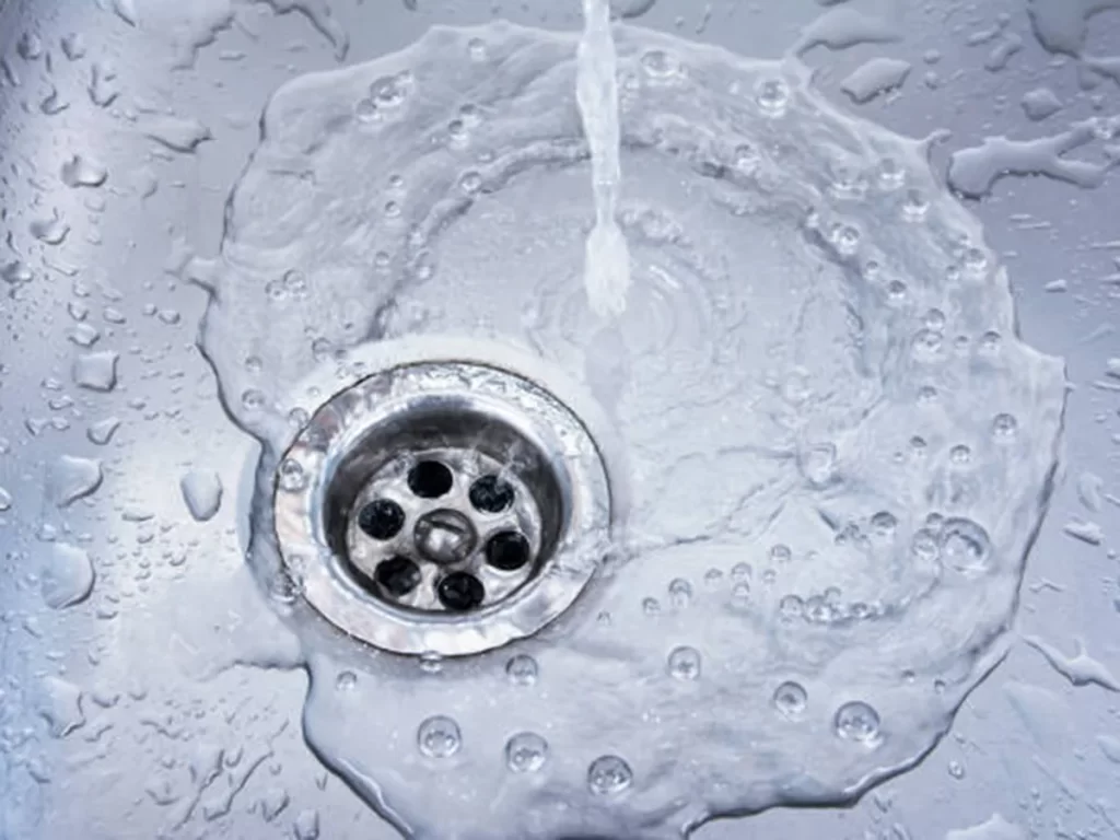 Water draining at sink