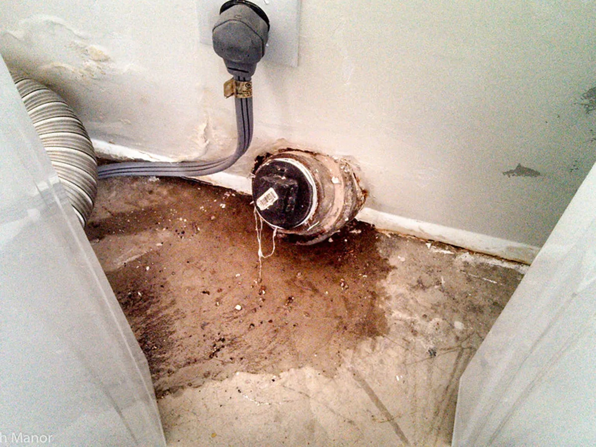 Water leak repair service fixing burst pipe in residential home