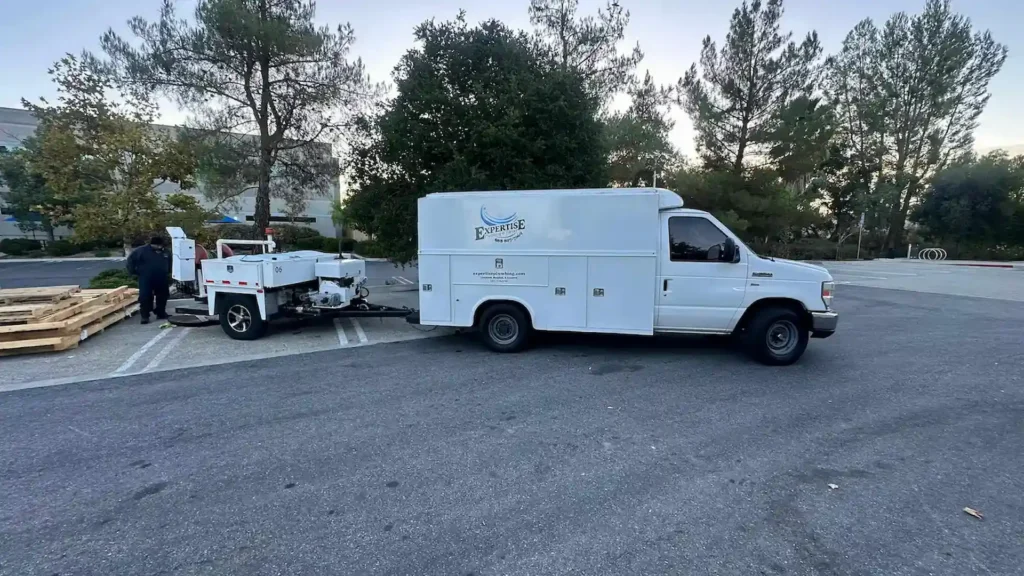 Expertise Plumbing utility truck and hydro jetting trailer